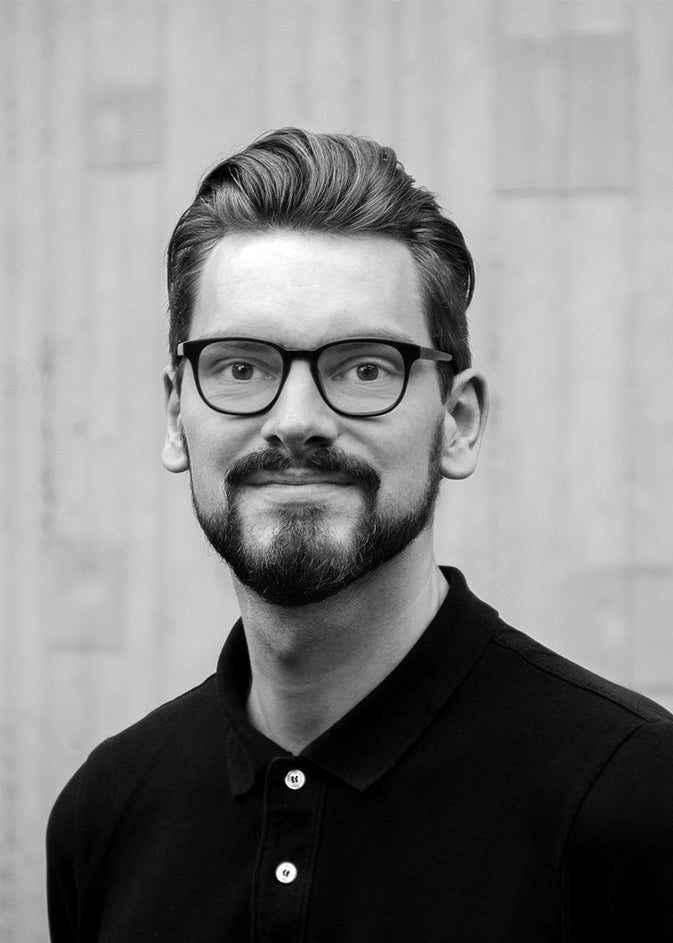 Sort-hvid portræt af designer Leonard Aldenhoff.